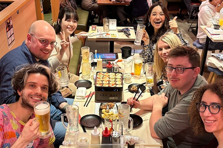Join fellow travelers and locals for a fun evening of making takoyaki enjoying unlimited drinks and sharing stories all while soaking up the lively ambiance of Tokyo's nightlife.