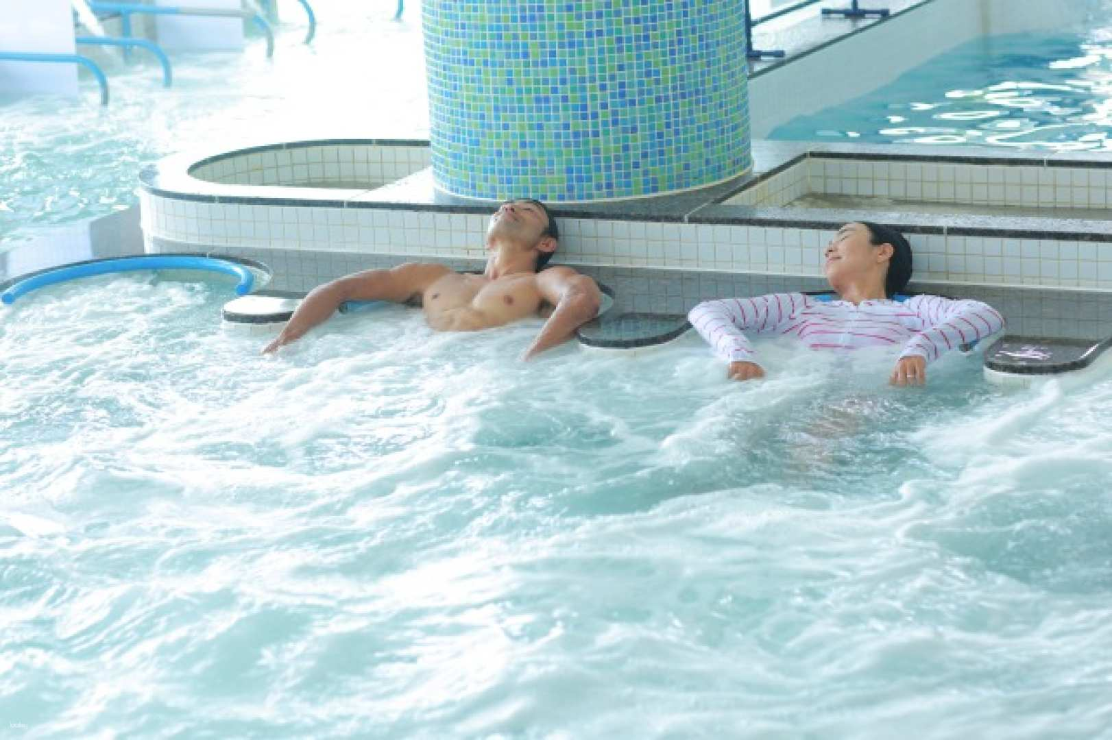 Relax in the rejuvenating sea water jacuzzi at TAPIC Thalasso Center where the peaceful ambiance invites families to unwind and enjoy the healing benefits of Okinawa's pristine seawater.