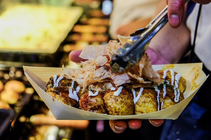 Savor the deliciousness of Osaka's iconic street food where each bite tells a story and every dish is a chance to capture unforgettable moments for your social feed.