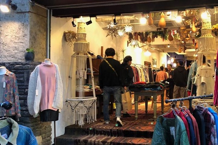 Explore Osaka's unique shopping districts with a local host uncovering hidden gems and personalized styles in charming boutiques and bustling markets customized just for you.