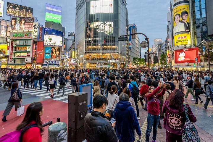 Discover the pulse of Tokyo at Shibuya Crossing where the energy of the crowd blends seamlessly with iconic architecture and bright city lights creating unforgettable moments around every corner.