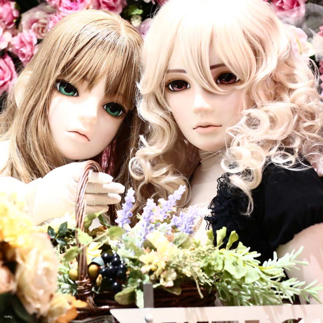 Experience the allure of anime culture by trying on a beautiful girl mask and yukata surrounded by floral backdrops that make for unforgettable photo opportunities.