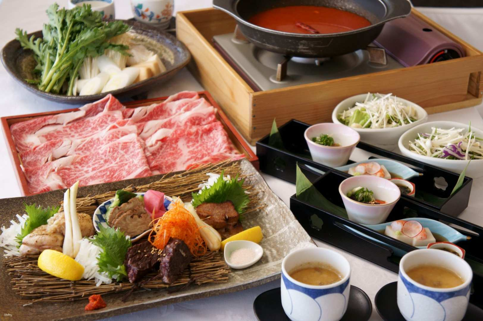 Indulge in an exquisite sukiyaki dinner featuring A5 grade Kuroge Wagyu beef complemented by the breathtaking views of Ginza from the top floor of Marronnier Gate.