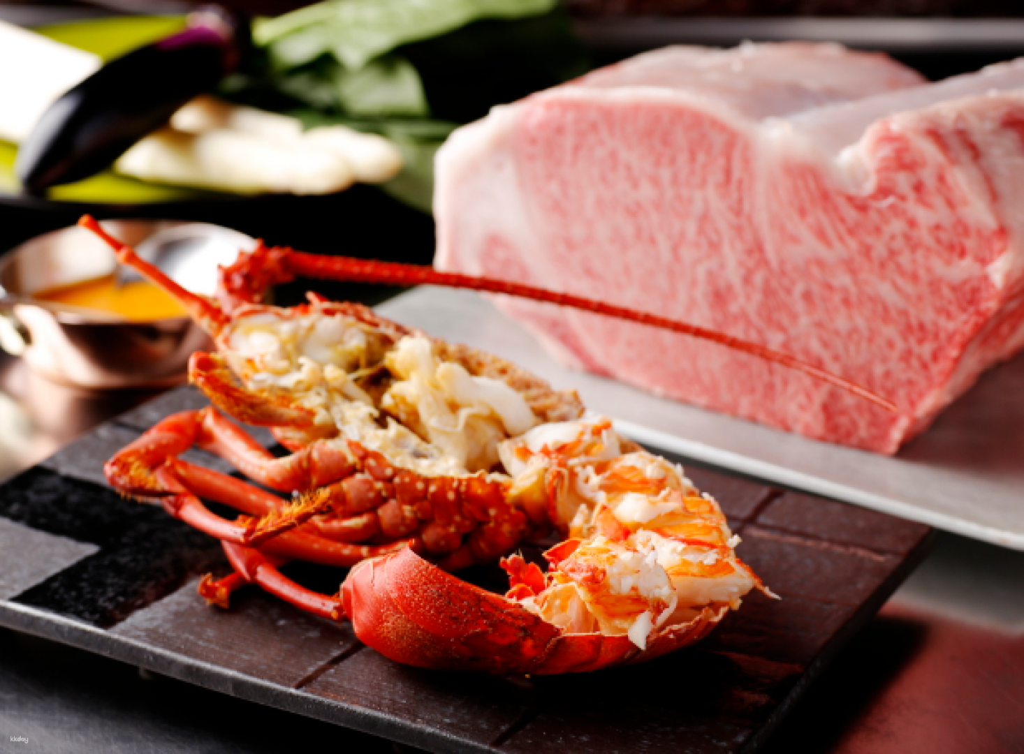 Savor exquisite Kobe beef and fresh seafood while chefs showcase their skills in an interactive dining experience at Mon Cher Ton Ton where flavors truly shine in every dish.