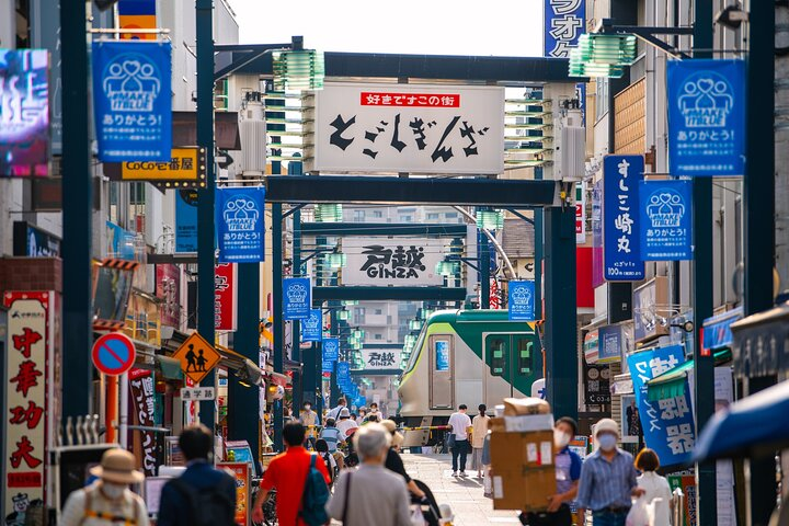 Explore the hidden gems of Ginza as you stroll through bustling back alleys discovering unique eateries and local treasures. Experience Tokyo's culinary scene like never before!