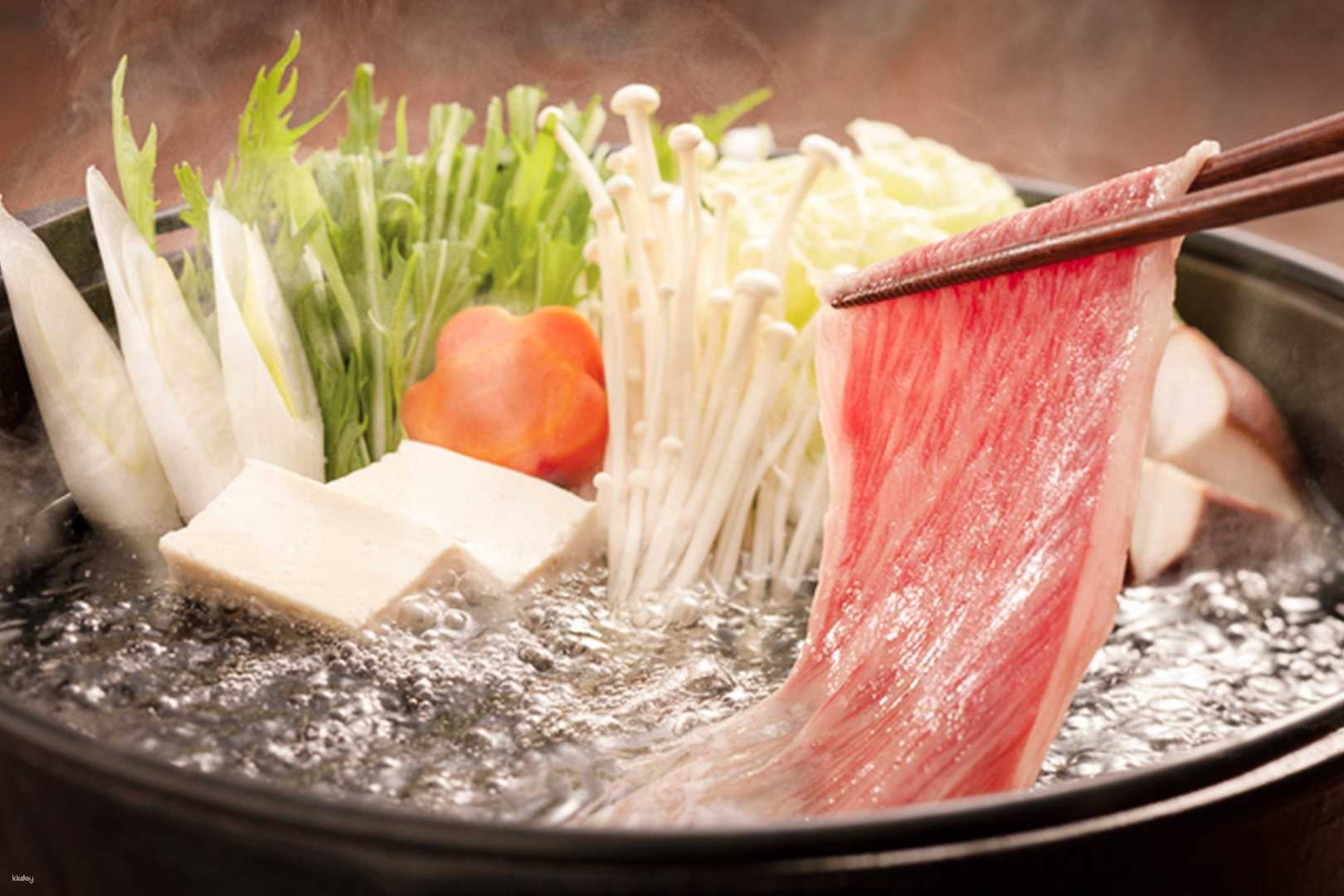 Savor the delicate flavors of ultra-thin Wagyu beef and fresh vegetables at Shabu ZEN all while enjoying stunning views of Tokyo Bay in a unique hot pot experience.