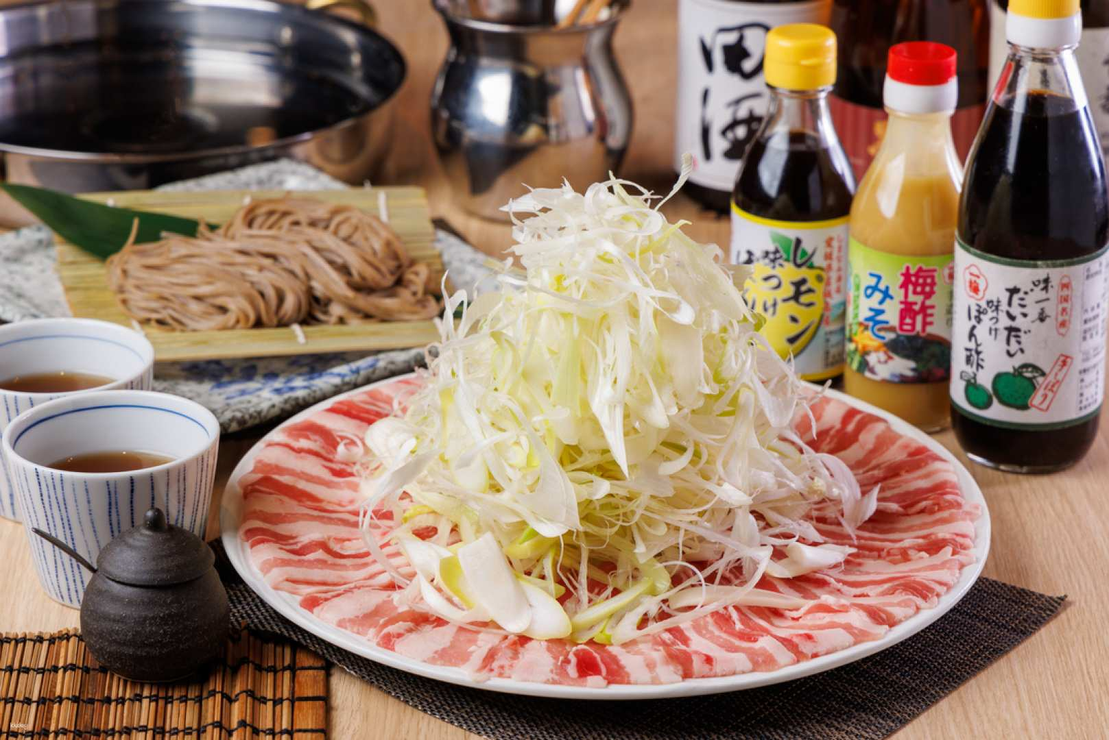 Savor the experience of domestic black pork shabu-shabu complemented by crisp vegetables and savory sides perfect for food lovers seeking a unique dining adventure in Tokyo.