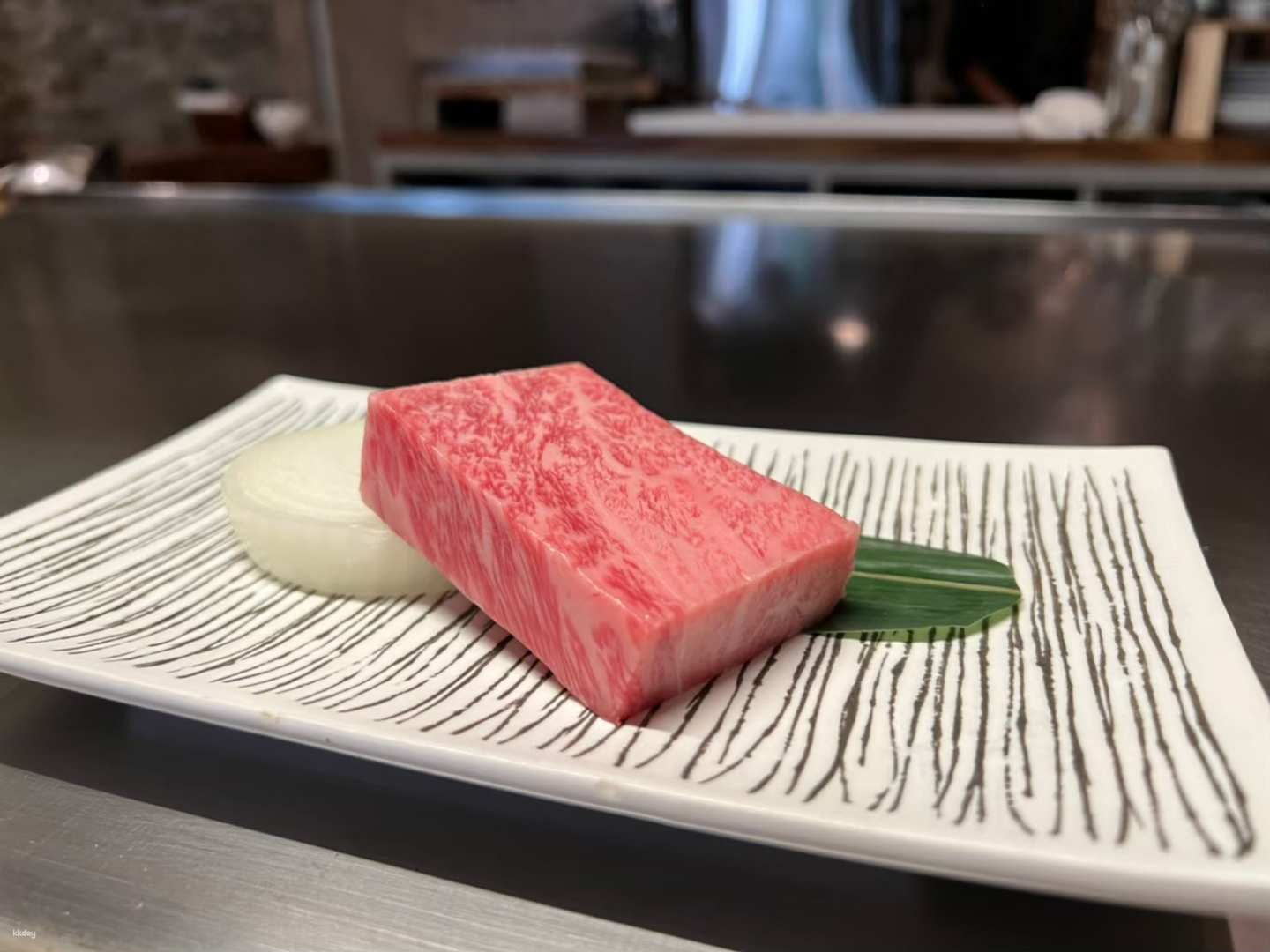 Indulge in the exquisite experience of Kobe beef at TeppanYaki KOBE where culinary artistry meets a stunning modern design just a short walk from JR Ebisu Station.