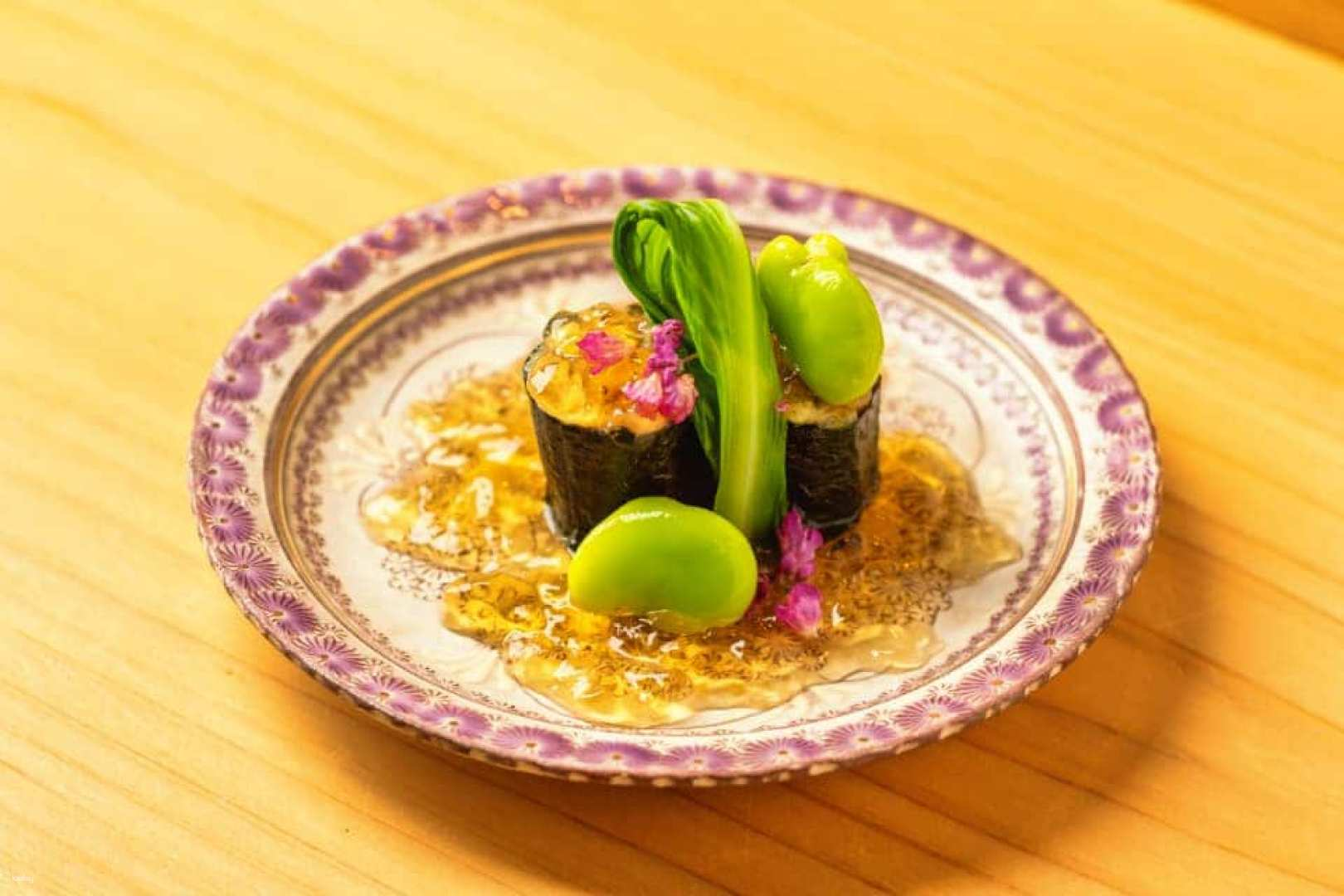 Savor exquisite seasonal flavors crafted by Chef Okada complemented by the stunning riverside views of cherry blossoms and autumn leaves creating an unforgettable dining experience in Tokyo.