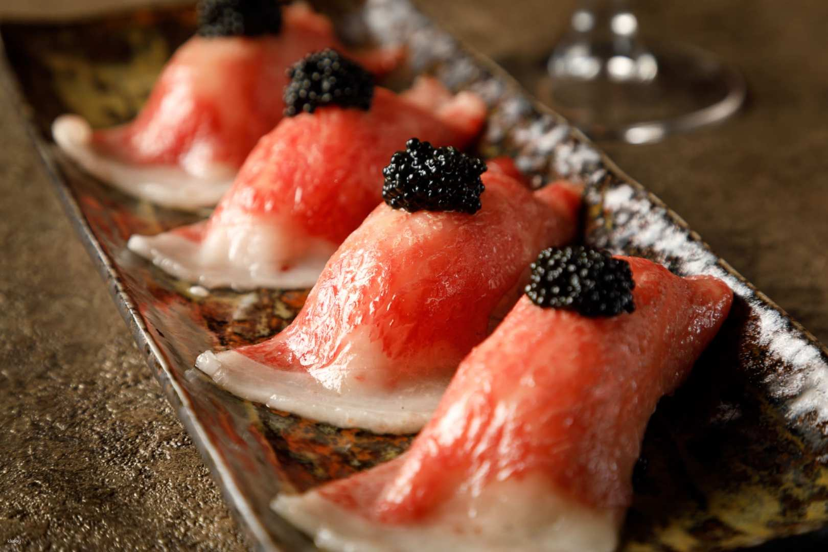 Discover the exquisite flavors of expertly grilled Kuroge Wagyu paired with delightful beverages just moments from Roppongi Station where culinary tradition meets modern dining.