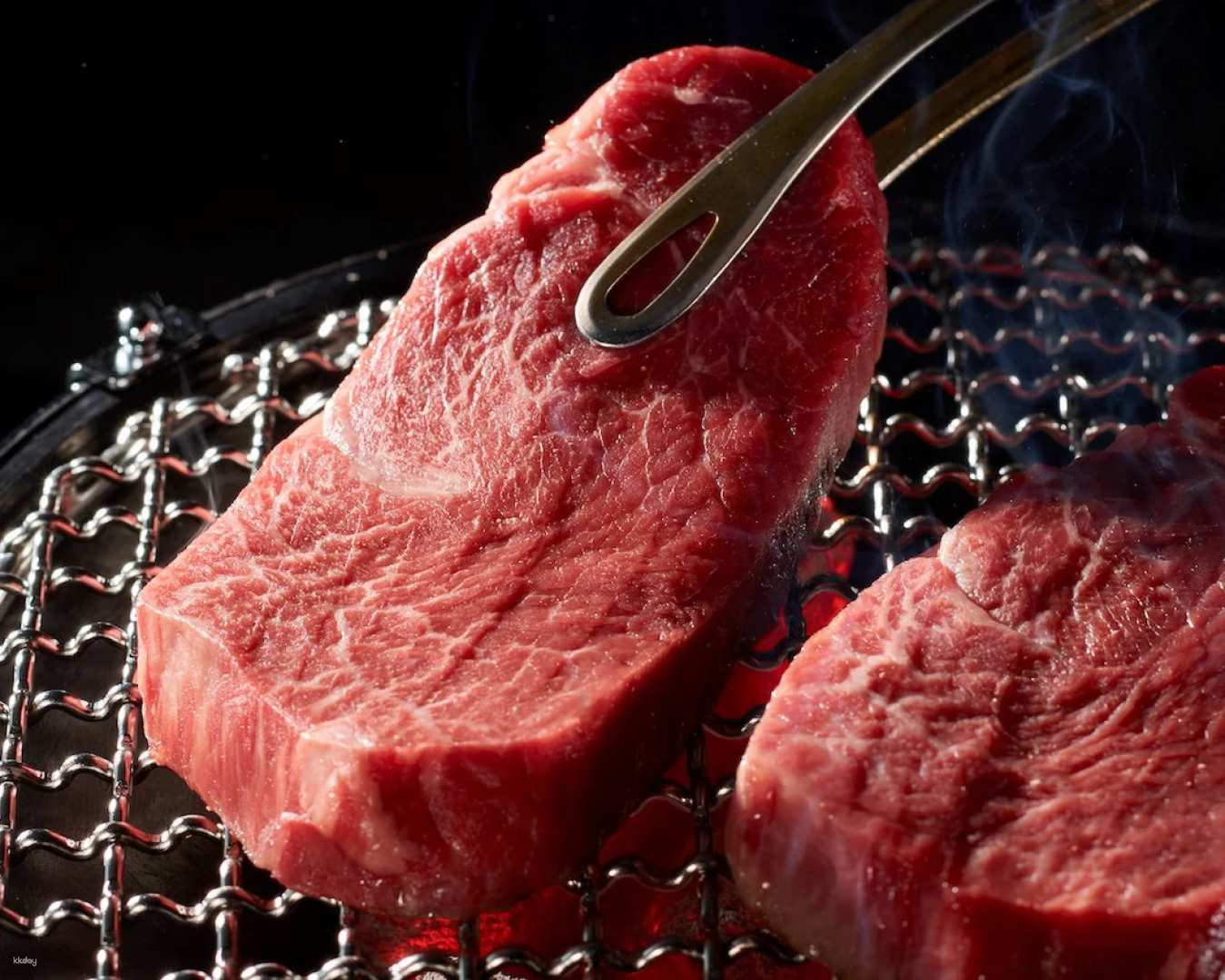 Savor the rich flavors of award-winning Kuroge Wagyu beef expertly grilled at your table complemented by an exquisite selection of wines teas and sake—an unforgettable culinary experience in Shinjuku.