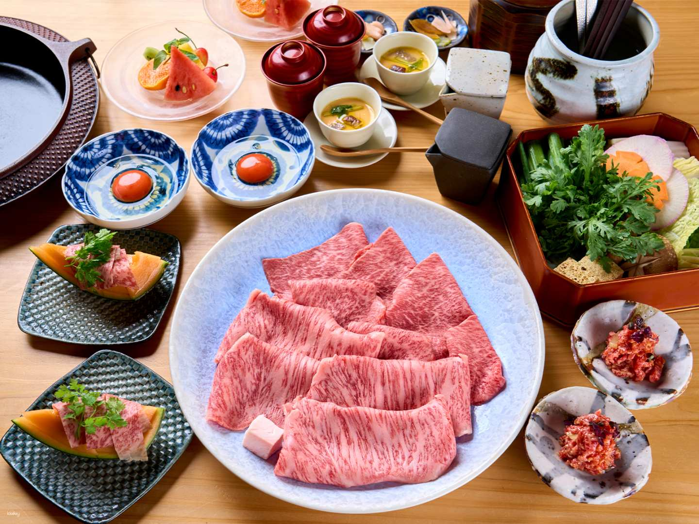 Experience the rich flavors of A5 grade Wagyu beef expertly prepared in sukiyaki and shabu-shabu complemented by fresh seasonal ingredients for a memorable culinary journey in Tokyo.
