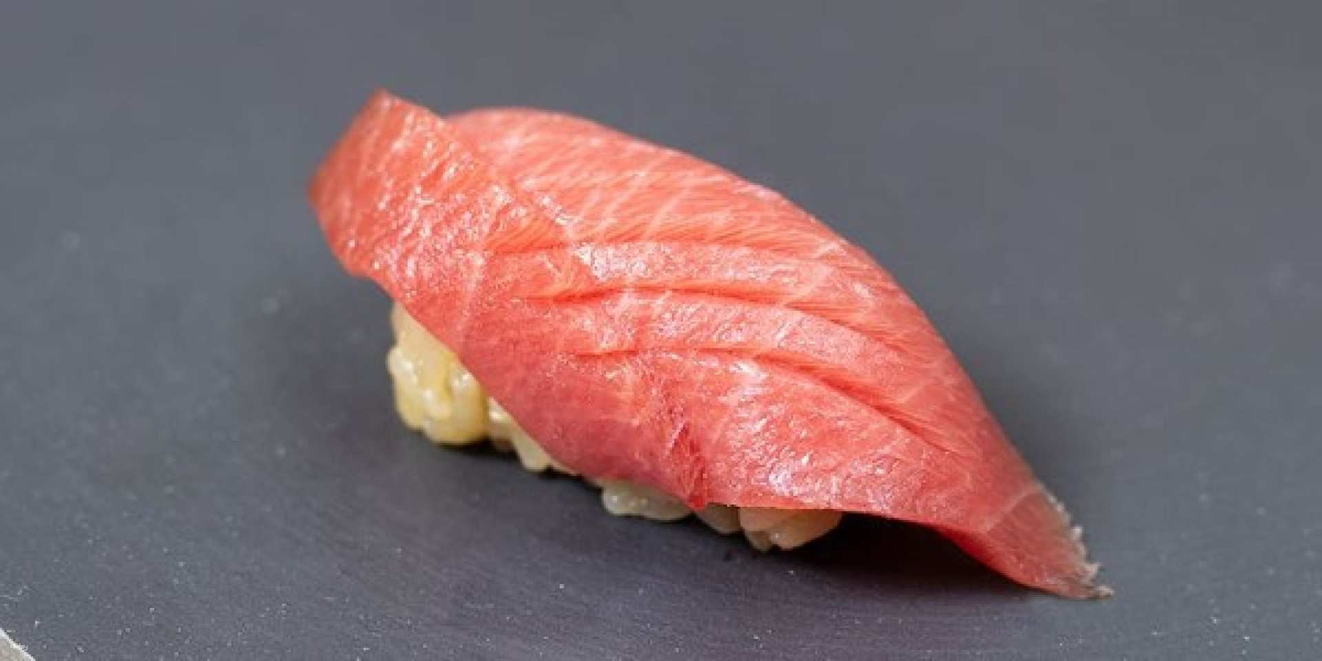 Experience the artistry of sushi with the renowned tuna nigiri where tradition meets modern dining—perfect for both intimate gatherings and business receptions in Tokyo.