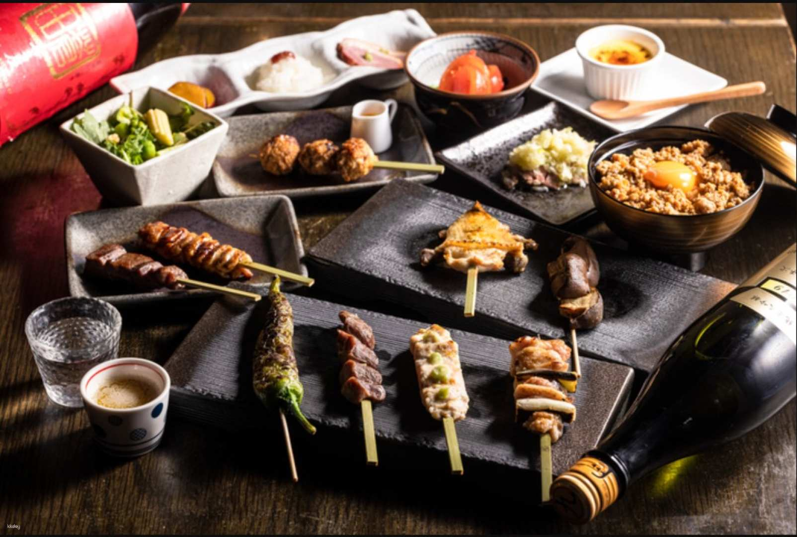 Indulge in succulent Michinoku clear chicken skewers paired with fine seasonal sake and wine all in a serene setting just steps from Ginza 1-chome station.