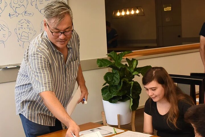 Experience the joy of creating manga alongside a professional artist. Dive into character design and drawing techniques surrounded by creativity and collaboration in Tokyo's lively workshop scene.