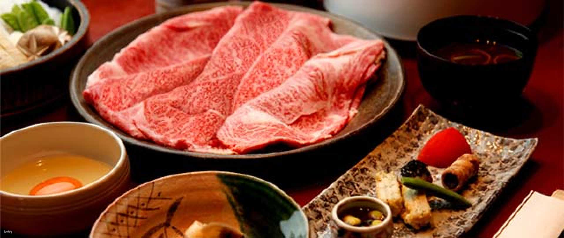 Immerse yourself in an authentic dining experience with exquisite Yamagata Yonezawa Wagyu skillfully prepared for a delightful sukiyaki and shabu-shabu feast in Tokyo's Michelin-starred gem.