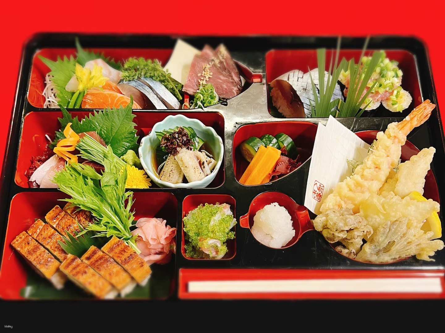 Delight in a traditional Shokado bento featuring seasonal fish A5 Wagyu beef and expertly crafted sushi and tempura a true culinary journey through Japan's rich heritage.