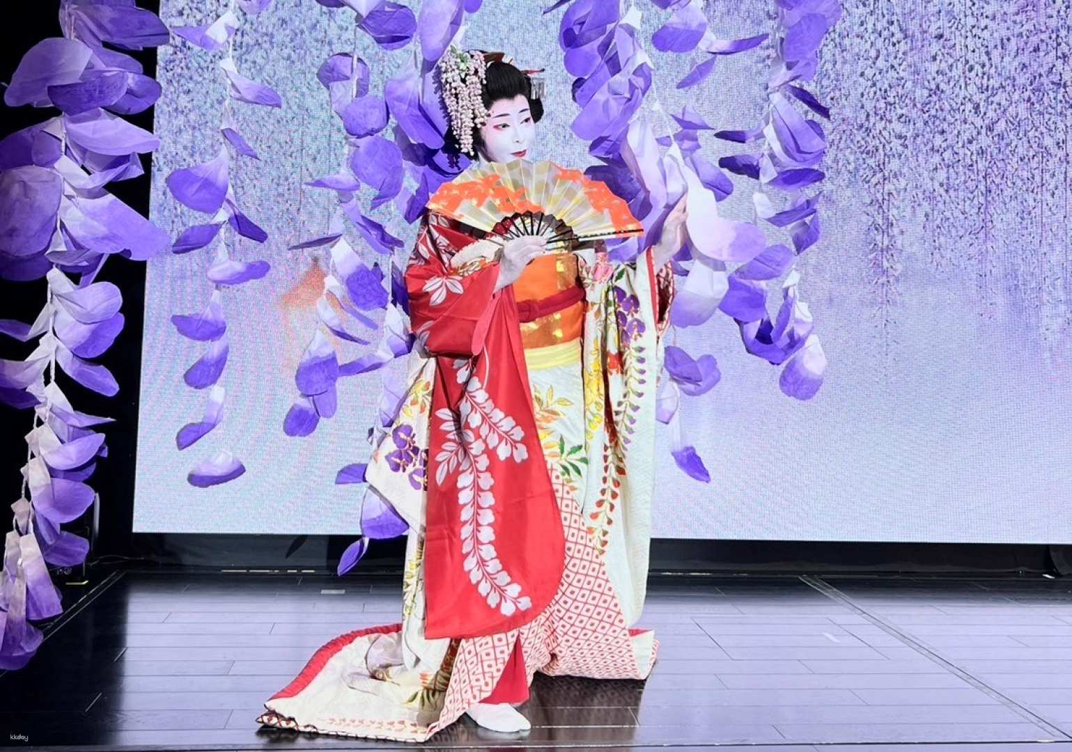 Experience the beauty of traditional Japanese dance as skilled performers bring the stage to life adorned in exquisite kimonos and artfully engaging with the audience. Capture unforgettable memories!
