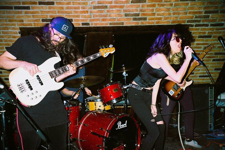 Dive into the heart of Tokyo's music culture where energetic live performances and intimate settings create an unforgettable night filled with sound and connection among fellow enthusiasts.