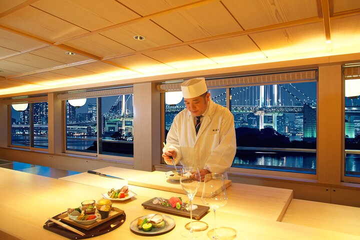Savor seasonal Japanese cuisine while gliding past iconic Tokyo landmarks like the Rainbow Bridge and Tokyo Skytree all from the comfort of a traditional Yakatabune boat.