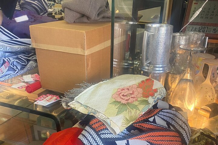 Discover hidden treasures among charming antiques and intricate crafts capturing the essence of local life in Nagoya. Customize your journey through memory-filled shops and unique finds.