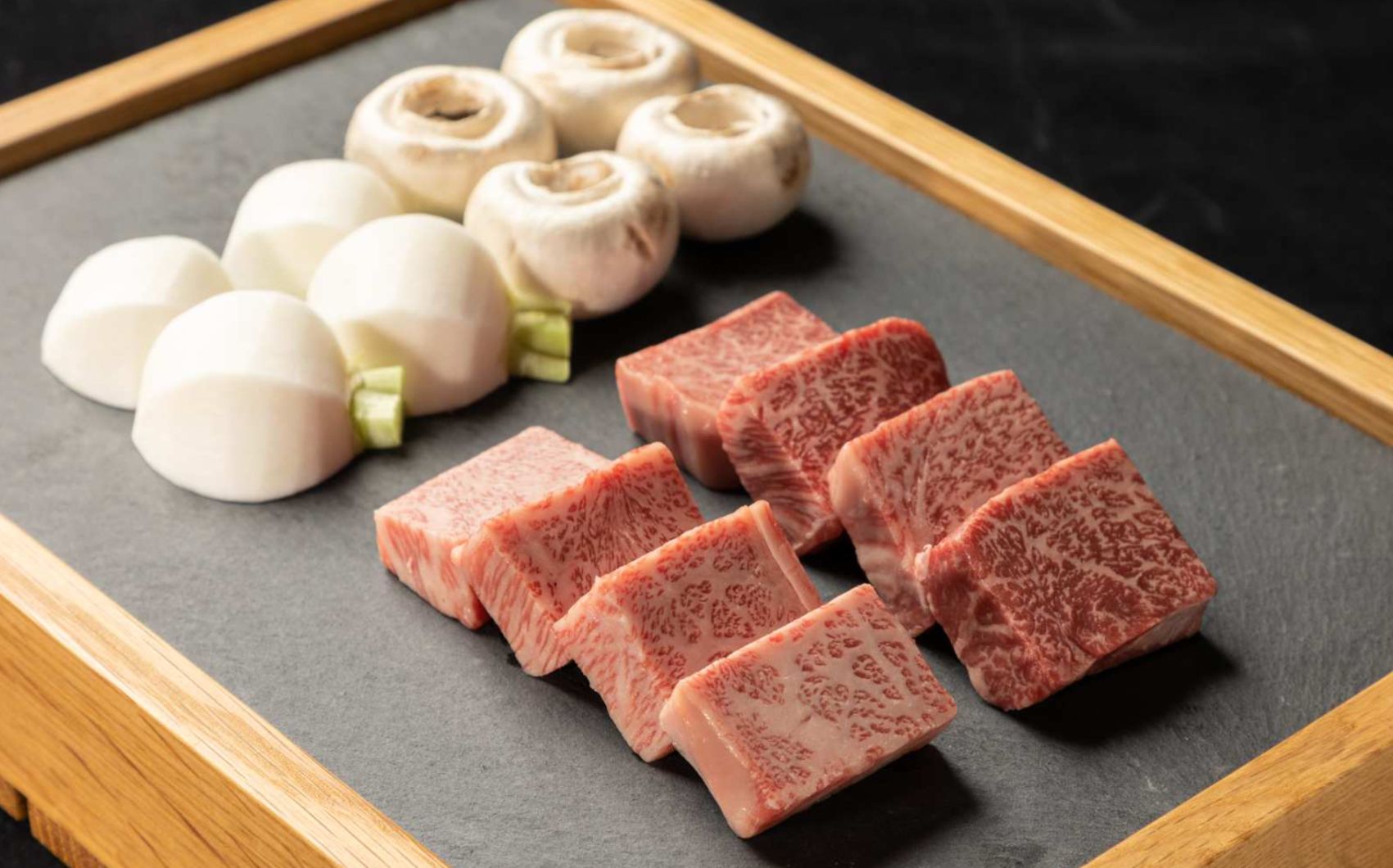 Savor the rich flavors of expertly grilled Wagyu beef alongside perfectly prepared accompaniments at Ushi Jirushi where each dish promises a memorable dining experience in Tokyo.