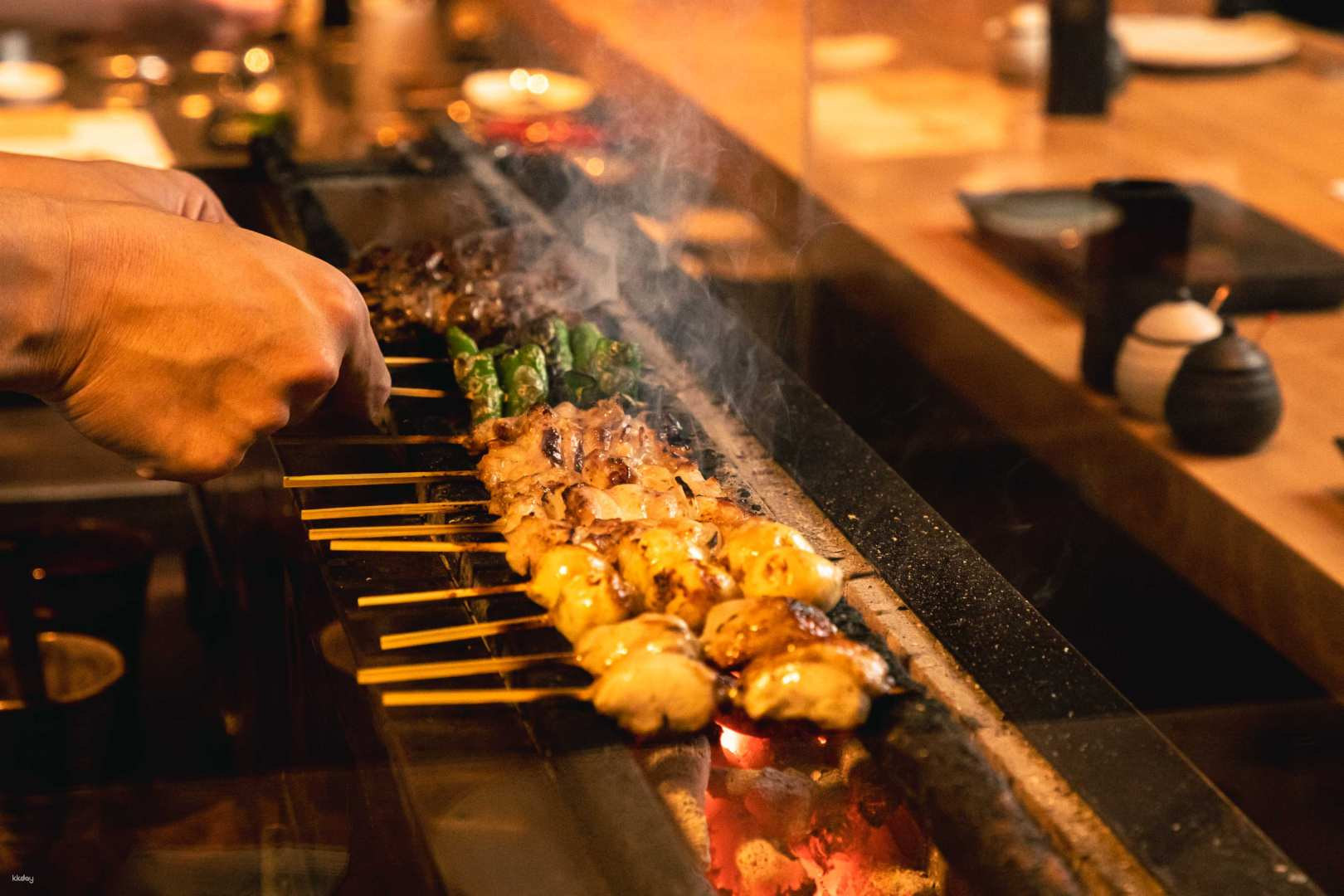 Savor the delicate flavors of expertly grilled yakitori in a serene setting complemented by innovative desserts that make dining at Yakitori Ruike a memorable experience in Tokyo.