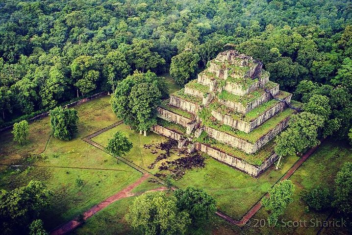 Discover the stunning architecture of Koh Ker surrounded by lush greenery and immerse yourself in the rich history of Cambodia making every moment a unique adventure.