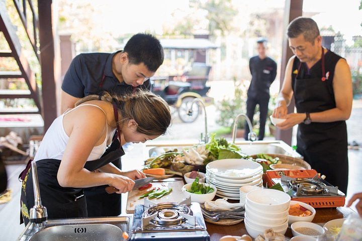 Immerse yourself in the rich flavors of Khmer cuisine while learning from local chefs sourcing fresh ingredients and enjoying the communal joy of cooking traditional dishes in a warm setting.