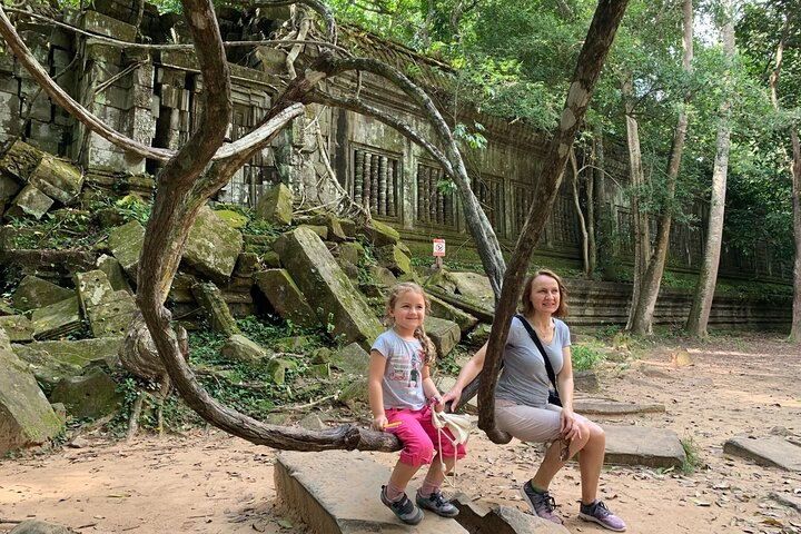 A happy sweet girl at Beng Mealea temple.