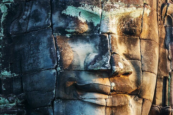 Situated right in the centre of Angkor Thom, Bayon is known as the 'face temple' due to its large staring heads that identify the uniqueness of this twelfth century temple. 