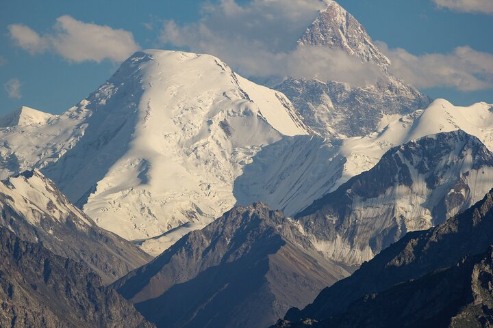 View to Khan Tengri peak, Charyn canyons and spruce forest - Photo 1 of 18
