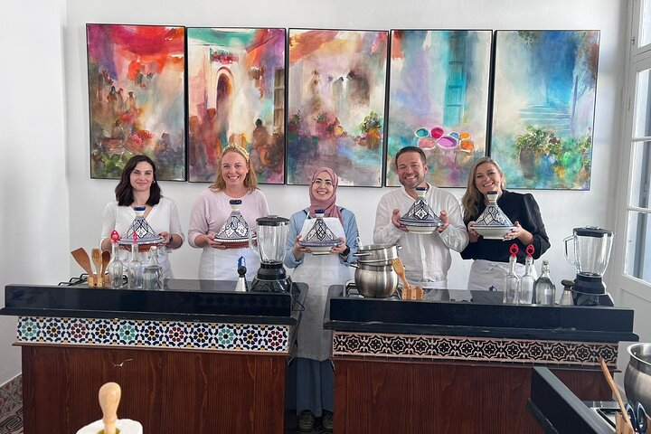 Our guests with their Experience Leader after making delicious Tagines