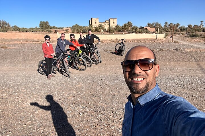 A beautiful team of travelers in the middle of the dry river