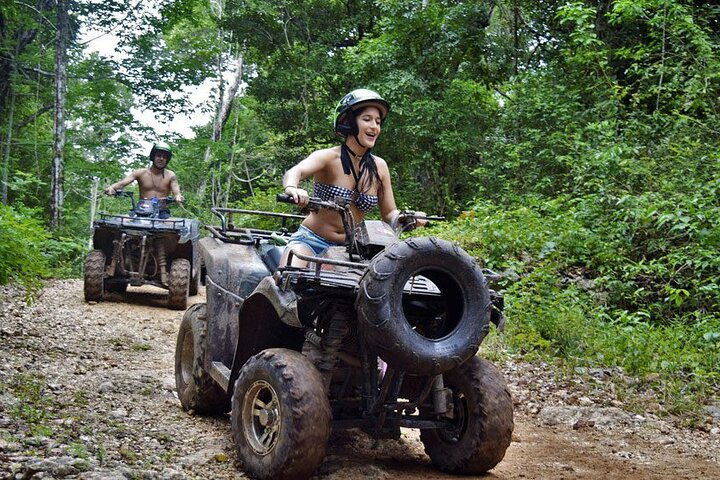 Feel the adrenaline of the atv through the jungle.