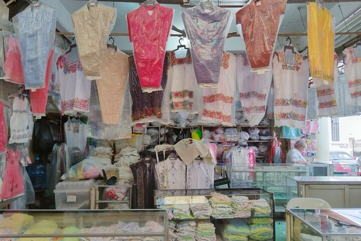 Traditional guayaberas and dresses at Mercado Lucas de Gálvez
