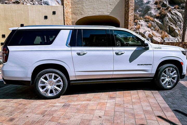 Roundtrip Deluxe Suburban Transportation - Photo 1 of 6