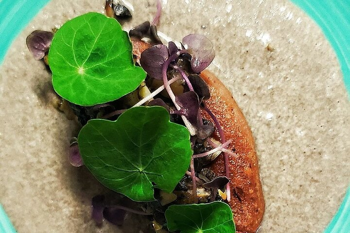 Bean tlacoyo in huitlacoche sauce