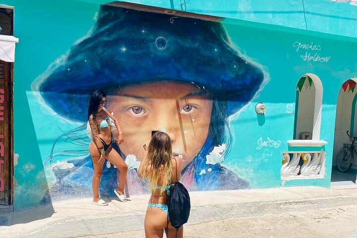 Explore Holbox and discover colorfull murals