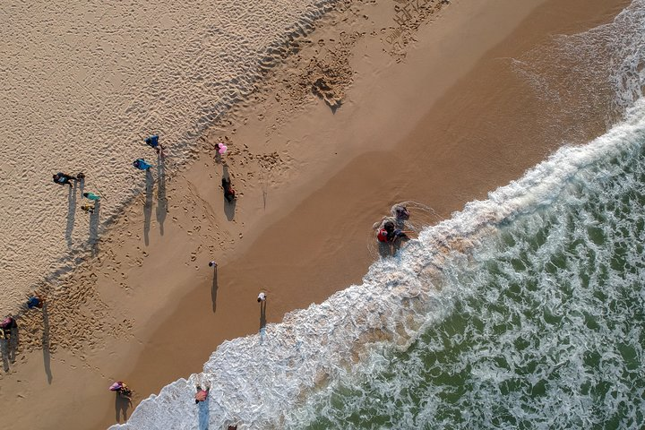 Experience the beauty of coastal bliss with seamless transfers as you explore sandy shores and the refreshing ocean waves creating moments to cherish in Malaysia's stunning landscapes.