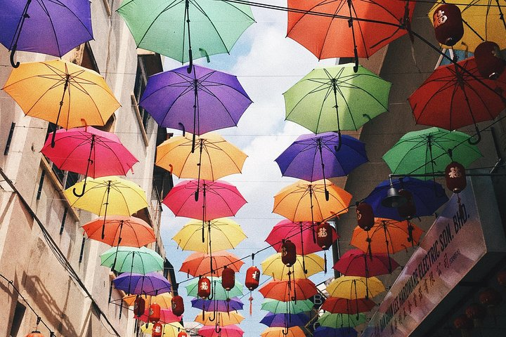 Explore the charming streets of Malaysia lined with colorful umbrellas and lanterns while enjoying a seamless transfer and personalized tour from Malacca to Ipoh. Discover unwind and create lasting memories.