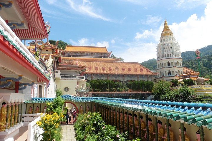 Explore the unique blend of heritage and modernity as you wander through colorful streets grand colonial buildings and serene temples experiencing the rich culture of Penang City.