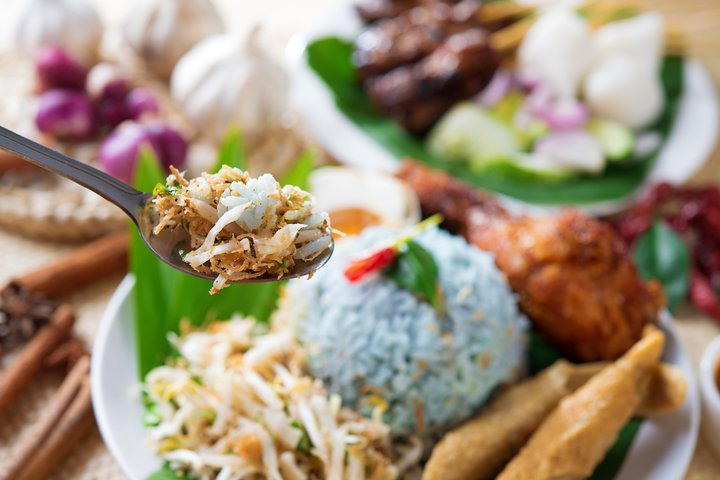Savor the flavors of Penang with authentic Malaysian dishes crafted from fresh ingredients and enjoyed in a serene garden setting alongside fellow culinary enthusiasts. A true taste adventure awaits!