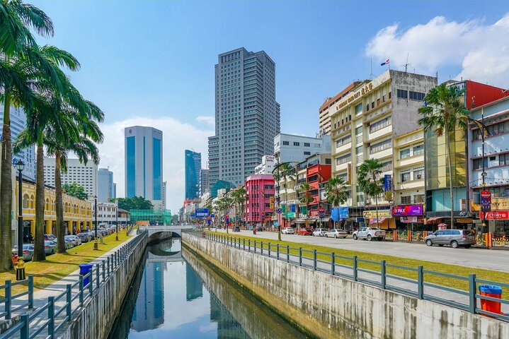 Discover the seamless journey from Johor Bahru to Mersing jetty surrounded by a blend of modern buildings and scenic waterways enhancing your travel experience effortlessly.