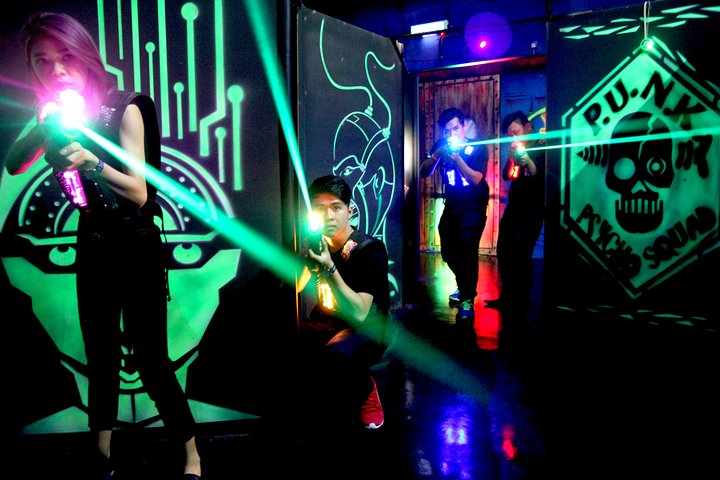 Experience the excitement of Laser Battle in Johor Bahru where players navigate a vibrant arena immersing themselves in strategic gameplay with beams of light illuminating the space. Perfect for action seekers!