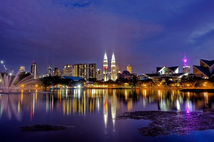 Experience a seamless ride from Malacca to Kuala Lumpur enjoying the stunning skyline and reflective waters as you embark on your city adventure. Travel made easy with personalized service.