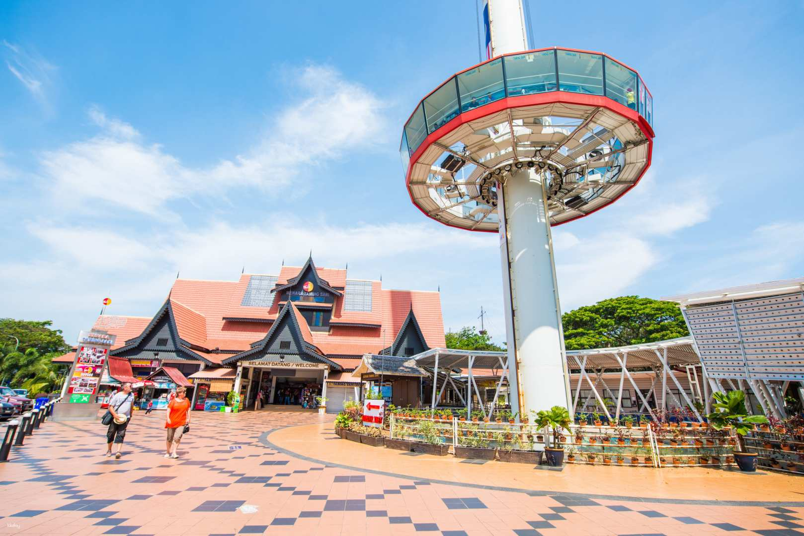 Experience sweeping views of Melaka atop the Taming Sari Tower where the city's charm unfolds from new heights perfect for sharing with loved ones and capturing unforgettable memories.