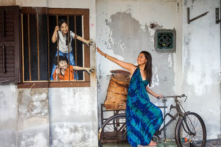 Explore the playful spirit of Penang as you interact with local culture from historic streets to artistic murals creating memories that blend tradition and charm in every visit.