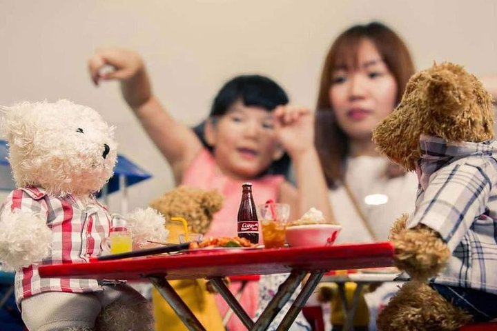 Immerse yourself in a delightful experience where teddy bears come to life sharing meals and laughter creating unforgettable memories for families exploring the charm of Penang's TeddyVille Museum.