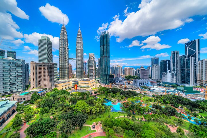 Visit Iconic Petronas Twin Towers, Suria KLCC Shopping Mall & Beautiful KLCC Park with Locals